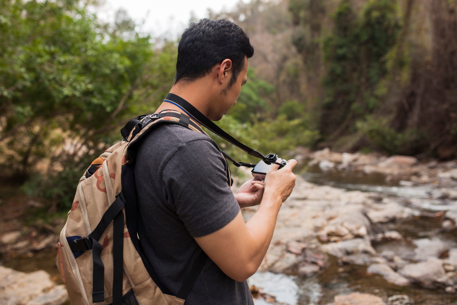 Young Gen Z traveler exploring scenic travel destination in 2025