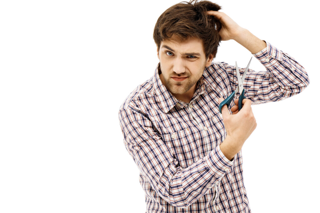 man massaging oil into scalp for faster hair growth in 1 week